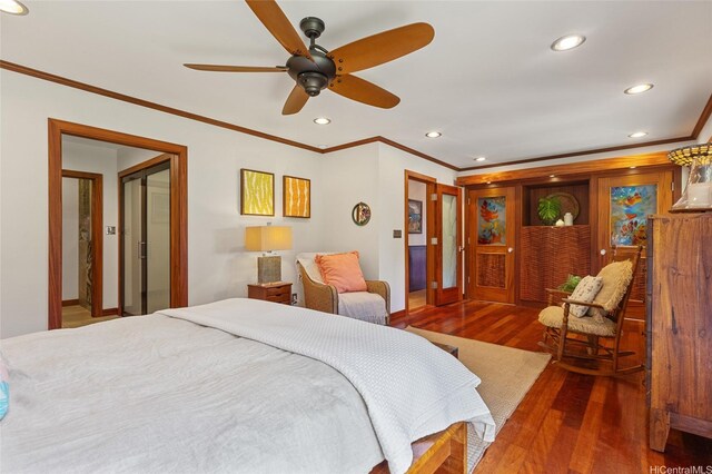bedroom with crown molding, recessed lighting, and wood finished floors