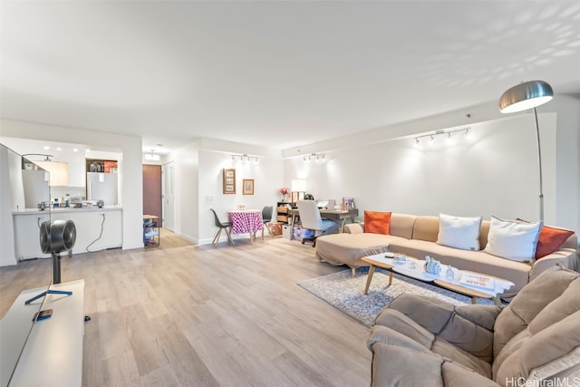415 S St Unit 302, Honolulu, HI 96813 - living area with track lighting and light wood-style floors