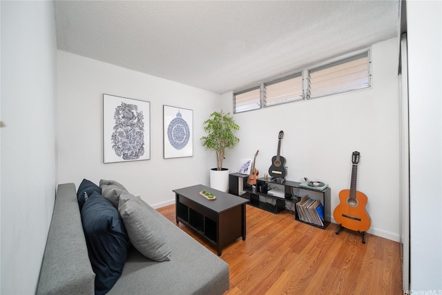 3030 Ala Ilima St Unit 301, Honolulu, HI 96818 - living room featuring light wood-style flooring