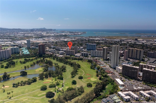 aerial view featuring a city view, a water view, and view of golf course
