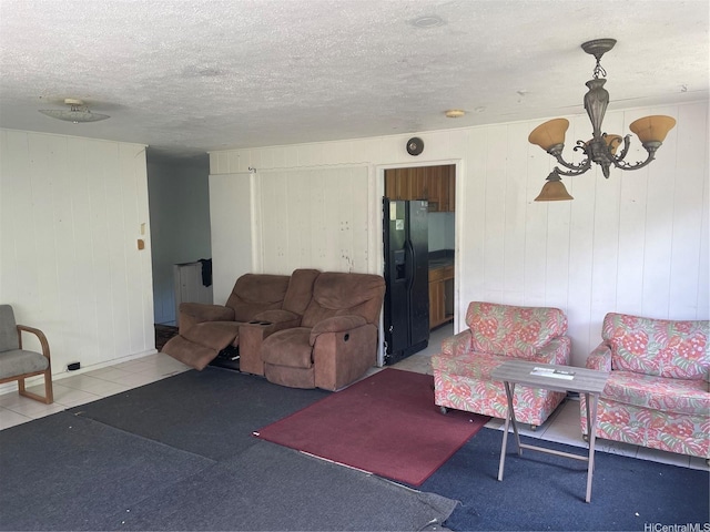 2929 Laelae Way, Honolulu, HI 96819 - carpeted living room with wooden walls, a textured ceiling, and an inviting chandelier