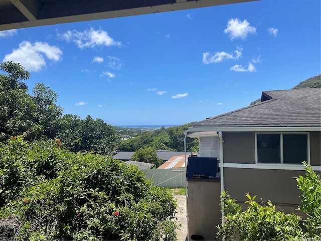 2929 Laelae Way, Honolulu, HI 96819 - view of property exterior with roof with shingles and fence