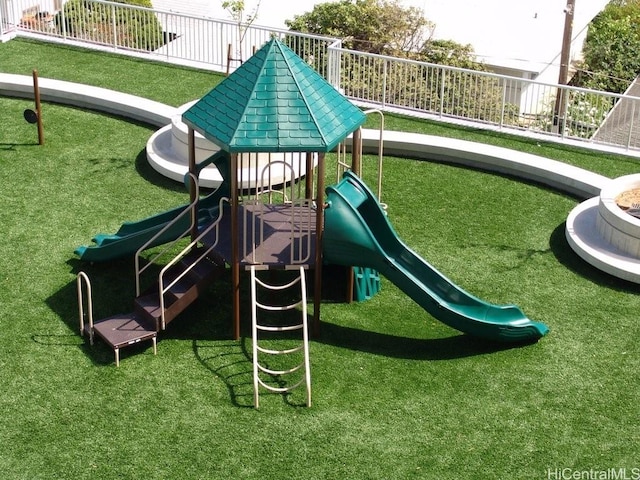 communal playground featuring fence