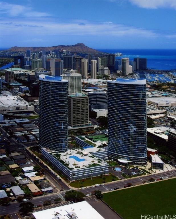 birds eye view of property featuring a city view
