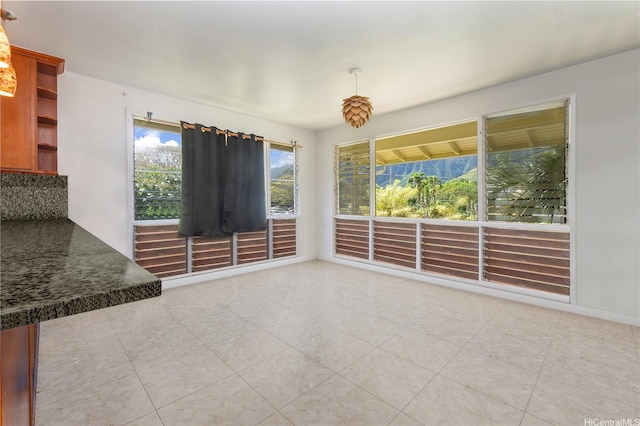 47-325 Ahuimanu Rd, Kaneohe, HI 96744 - unfurnished dining area featuring tile patterned flooring