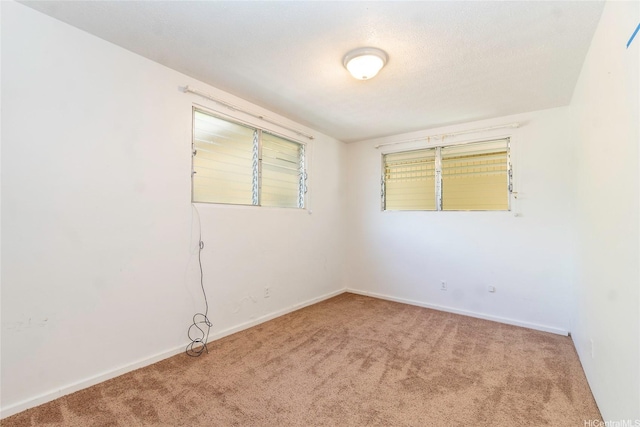 47-325 Ahuimanu Rd, Kaneohe, HI 96744 - carpeted empty room with baseboards