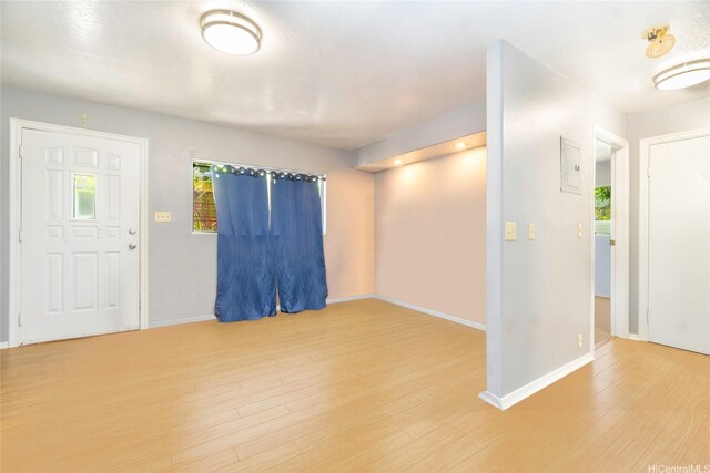 47-325 Ahuimanu Rd, Kaneohe, HI 96744 - entrance foyer featuring wood finished floors, a healthy amount of sunlight, and baseboards