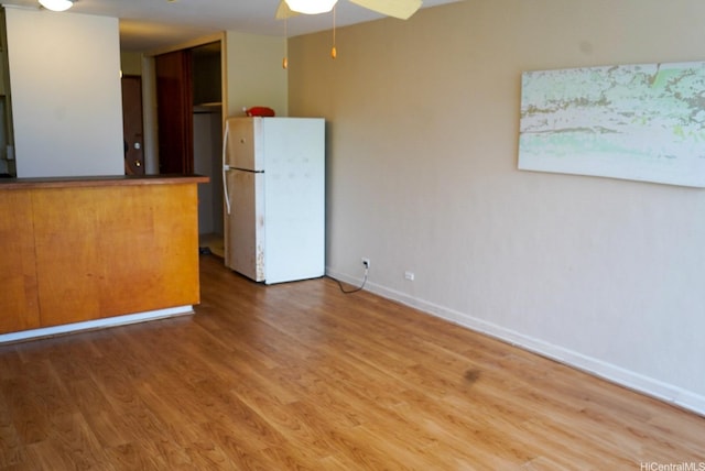 53-549 Kamehameha Hwy Unit 514, Hauula, HI 96717 - empty room featuring light wood-type flooring and a ceiling fan