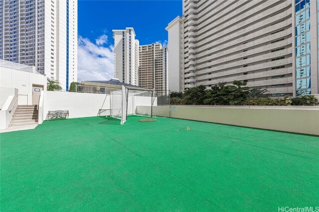 469 Ena Rd Unit 505, Honolulu, HI 96815 - view of patio / terrace with fence and a view of city