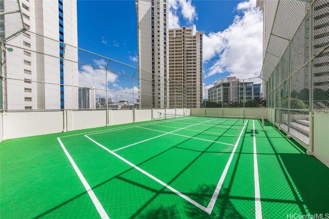 469 Ena Rd Unit 505, Honolulu, HI 96815 - view of tennis court featuring fence