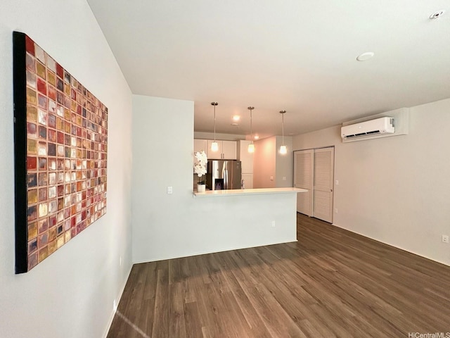91-3525 Kauluakoko St Unit 2213, Ewa Beach, HI 96706 - unfurnished living room with a wall mounted AC and dark wood-style floors