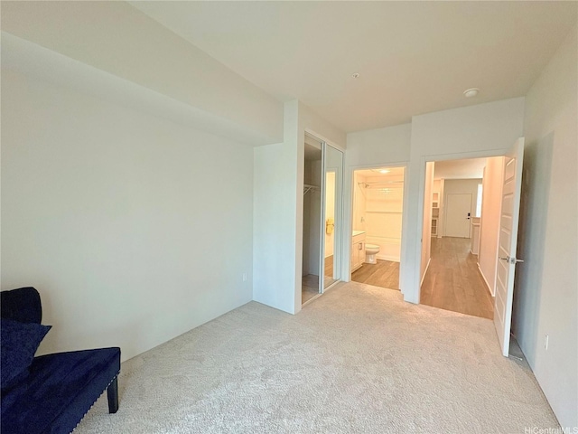 91-3525 Kauluakoko St Unit 2213, Ewa Beach, HI 96706 - unfurnished bedroom with light colored carpet and ensuite bath