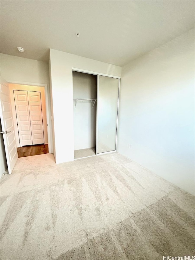 91-3525 Kauluakoko St Unit 2213, Ewa Beach, HI 96706 - unfurnished bedroom featuring carpet floors and a closet