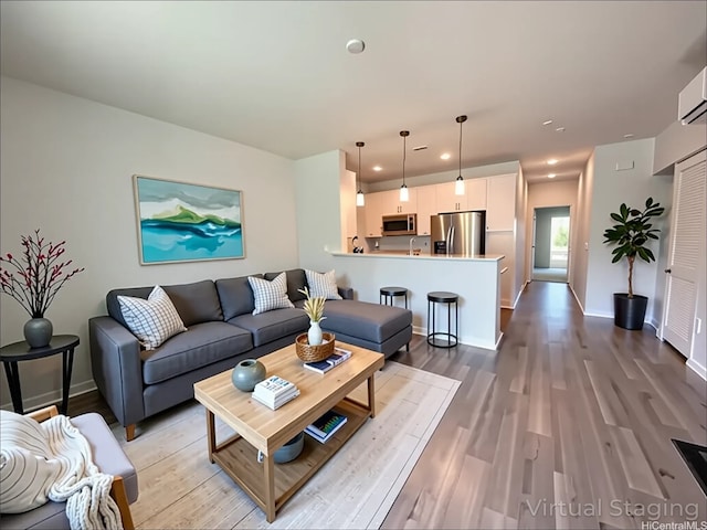 91-3525 Kauluakoko St Unit 2213, Ewa Beach, HI 96706 - living room with light wood-style floors and recessed lighting