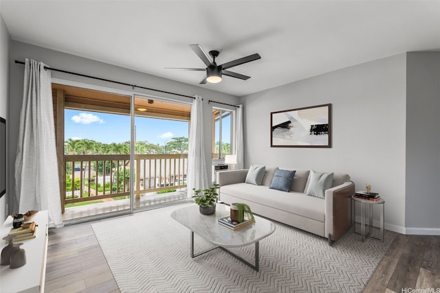 91-1213 Kaneana St Unit 12D, Ewa Beach, HI 96706 - living room with wood finished floors and ceiling fan