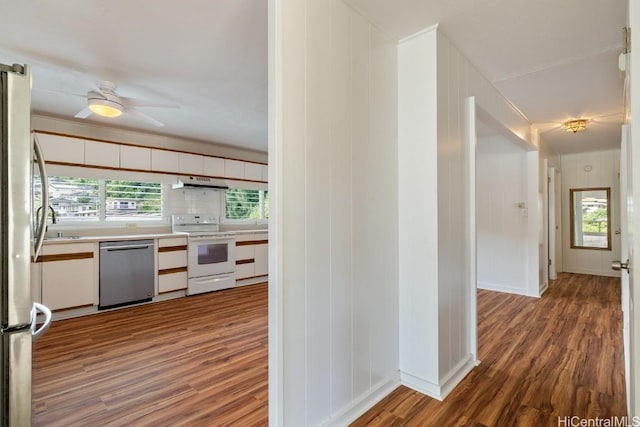hallway with wood finished floors