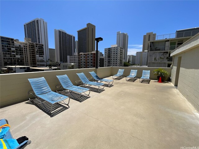 2452 Tusitala St Unit 703, Honolulu, HI 96815 - view of patio / terrace featuring a view of skyline