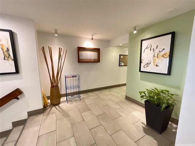 2452 Tusitala St Unit 703, Honolulu, HI 96815 - hallway featuring baseboards