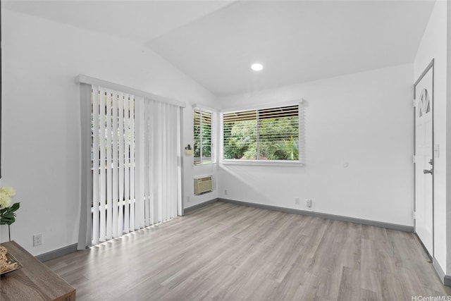 95-510 Wikao St Unit F206, Mililani, HI 96789 - empty room with wood finished floors, vaulted ceiling, baseboards, and recessed lighting
