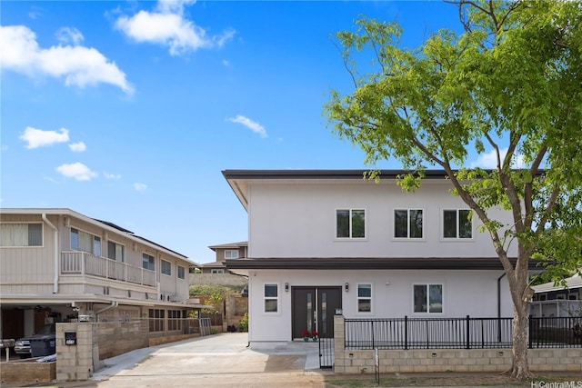 315 Hanakoa St, Honolulu, HI 96825 - rear view of property with stucco siding and fence