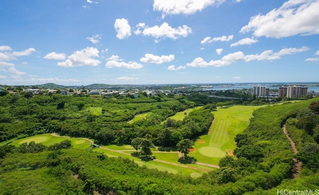 bird's eye view featuring golf course view and a water view