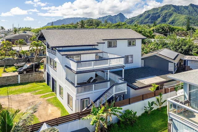 53-904 Kamehameha Hwy Unit 1, Hauula, HI 96717 - back of house with dirt driveway, a mountain view, roof with shingles, and stairway