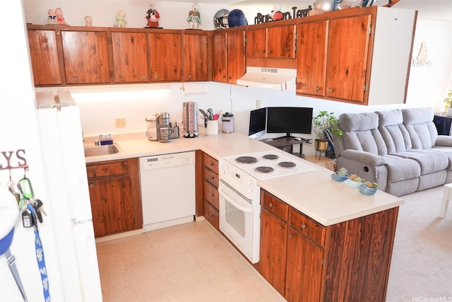 kitchen with open floor plan, light countertops, white appliances, and ventilation hood