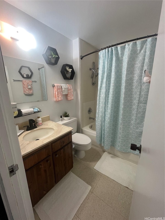 full bathroom with shower / tub combo, vanity, and toilet