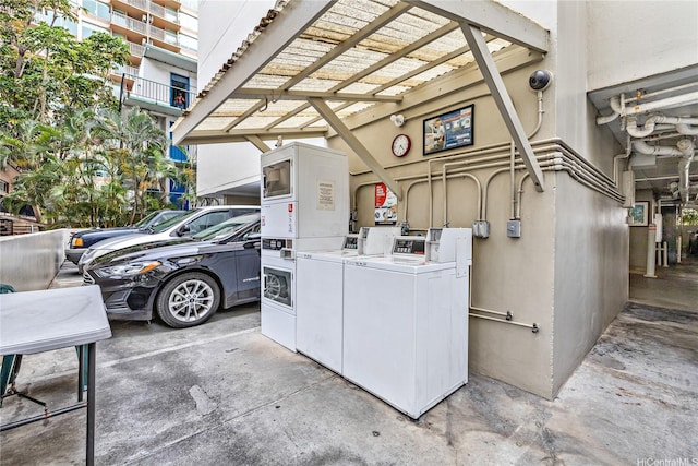 exterior space with separate washer and dryer and stacked washer and clothes dryer