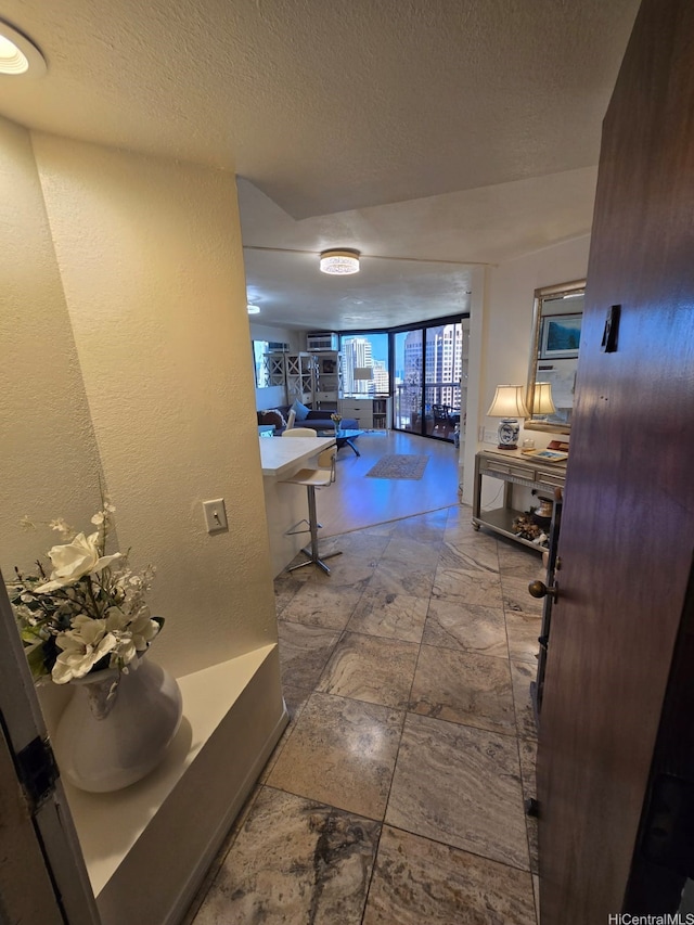 60 N Beretania St Unit 3209, Honolulu, HI 96817 - hallway featuring a textured ceiling and a textured wall