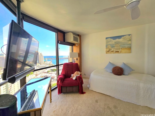 60 N Beretania St Unit 3209, Honolulu, HI 96817 - carpeted bedroom featuring expansive windows, a wall mounted AC, and ceiling fan