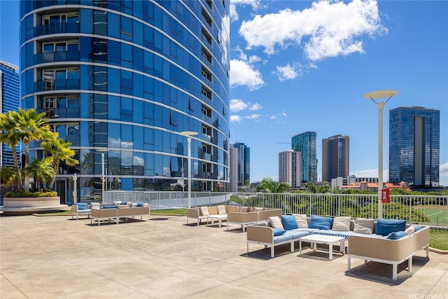 1288 Kapiolani Blvd Unit I2903, Honolulu, HI 96814 - view of community with an outdoor living space, a patio area, a city view, and fence