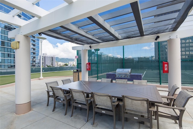 1288 Kapiolani Blvd Unit I2903, Honolulu, HI 96814 - view of patio / terrace featuring fence, outdoor dining area, area for grilling, and a pergola