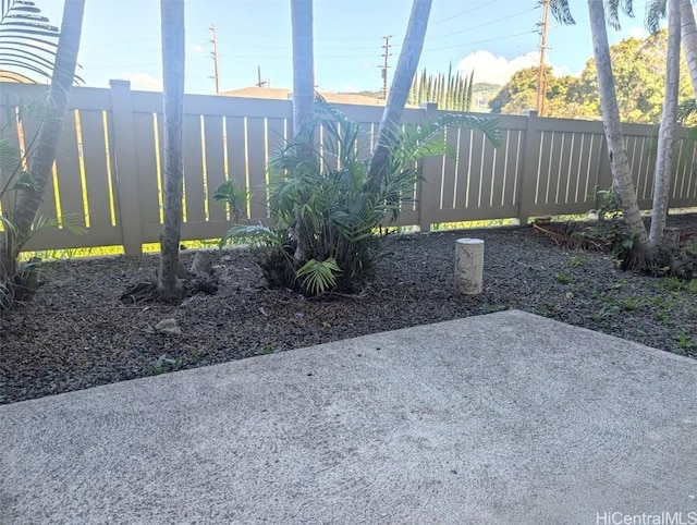 2845 Waialae Ave Unit 116, Honolulu, HI 96826 - view of yard featuring a fenced backyard and a patio area