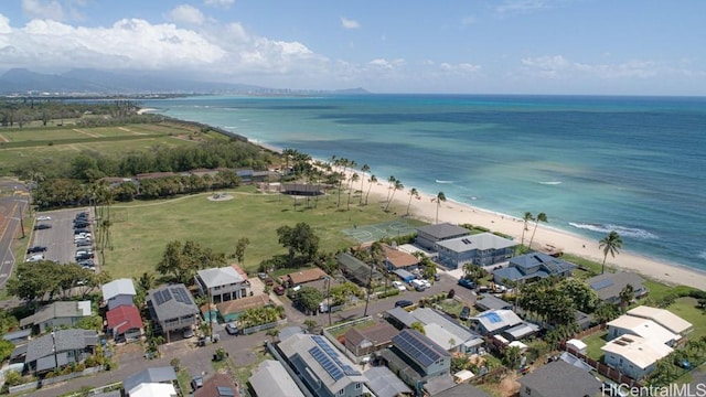 aerial view with a view of the beach and a water view