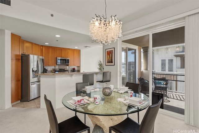 dining room with recessed lighting, a notable chandelier, light tile patterned floors, and visible vents