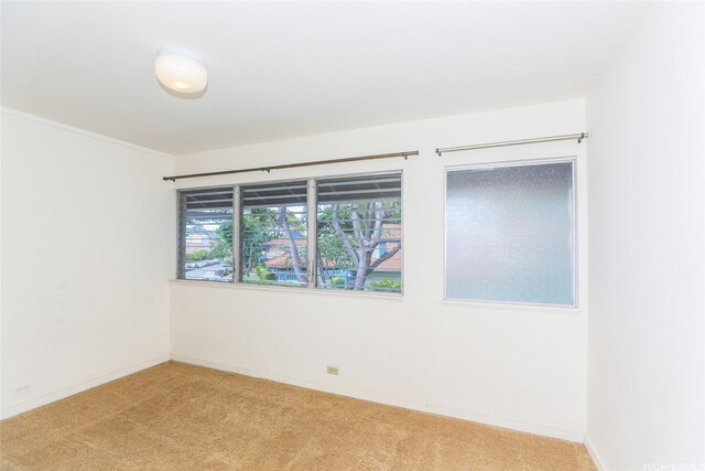 4202 Keanu St Unit 4, Honolulu, HI 96816 - unfurnished room featuring light carpet and baseboards