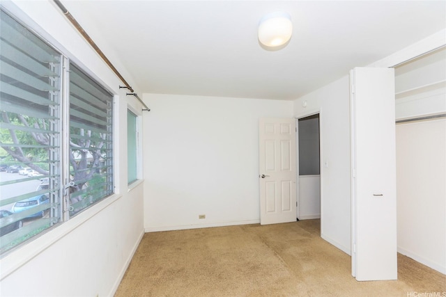 4202 Keanu St Unit 4, Honolulu, HI 96816 - unfurnished bedroom with light colored carpet and baseboards