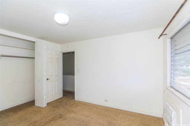 4202 Keanu St Unit 4, Honolulu, HI 96816 - unfurnished bedroom featuring light carpet, a closet, and baseboards