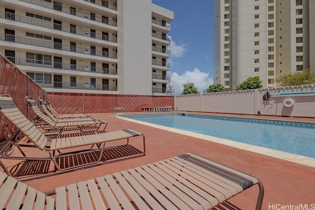 5122 Likini St Unit 616, Honolulu, HI 96818 - community pool featuring a patio