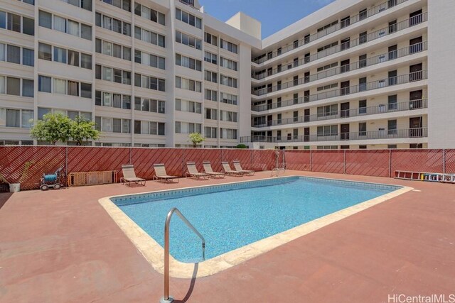 5122 Likini St Unit 616, Honolulu, HI 96818 - community pool with a patio area