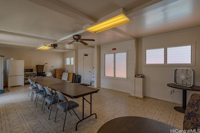 5122 Likini St Unit 616, Honolulu, HI 96818 - dining space featuring light flooring, beamed ceiling, and a ceiling fan
