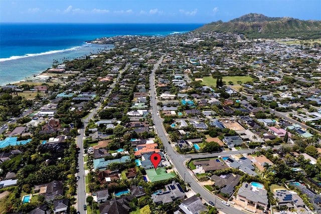birds eye view of property with a water and mountain view and a residential view