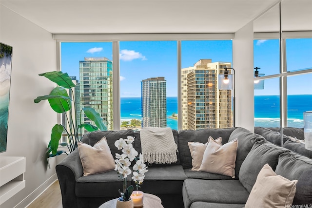 1009 Kapiolani Blvd Unit 4006, Honolulu, HI 96814 - living room featuring a water view, wood finished floors, and expansive windows