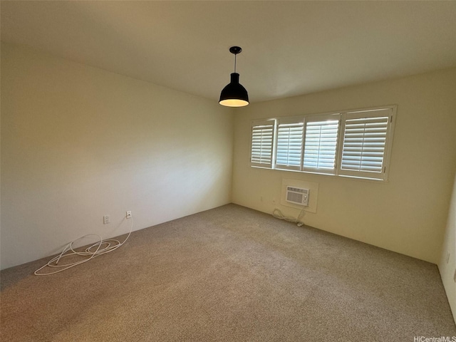 unfurnished room with light carpet and a wall mounted AC