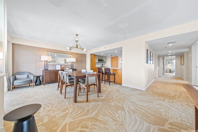 410 Atkinson Dr Unit 3326, Honolulu, HI 96814 - dining space featuring baseboards, recessed lighting, a chandelier, and light carpet