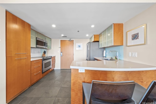 410 Atkinson Dr Unit 3326, Honolulu, HI 96814 - kitchen featuring a sink, light countertops, stainless steel appliances, and a peninsula