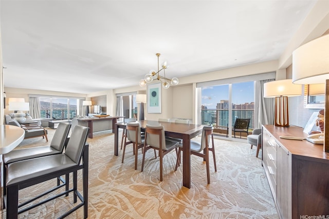 410 Atkinson Dr Unit 3326, Honolulu, HI 96814 - dining space featuring a notable chandelier and a wealth of natural light