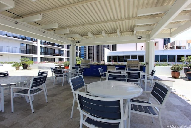 225 Queen St Unit 8C, Honolulu, HI 96813 - view of patio featuring outdoor dining area