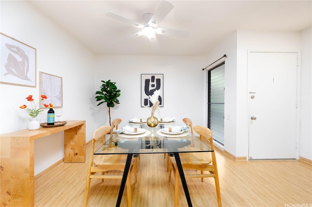 46-058 Aliikane Pl Unit 2114, Kaneohe, HI 96744 - dining space with light wood-type flooring, a ceiling fan, and baseboards